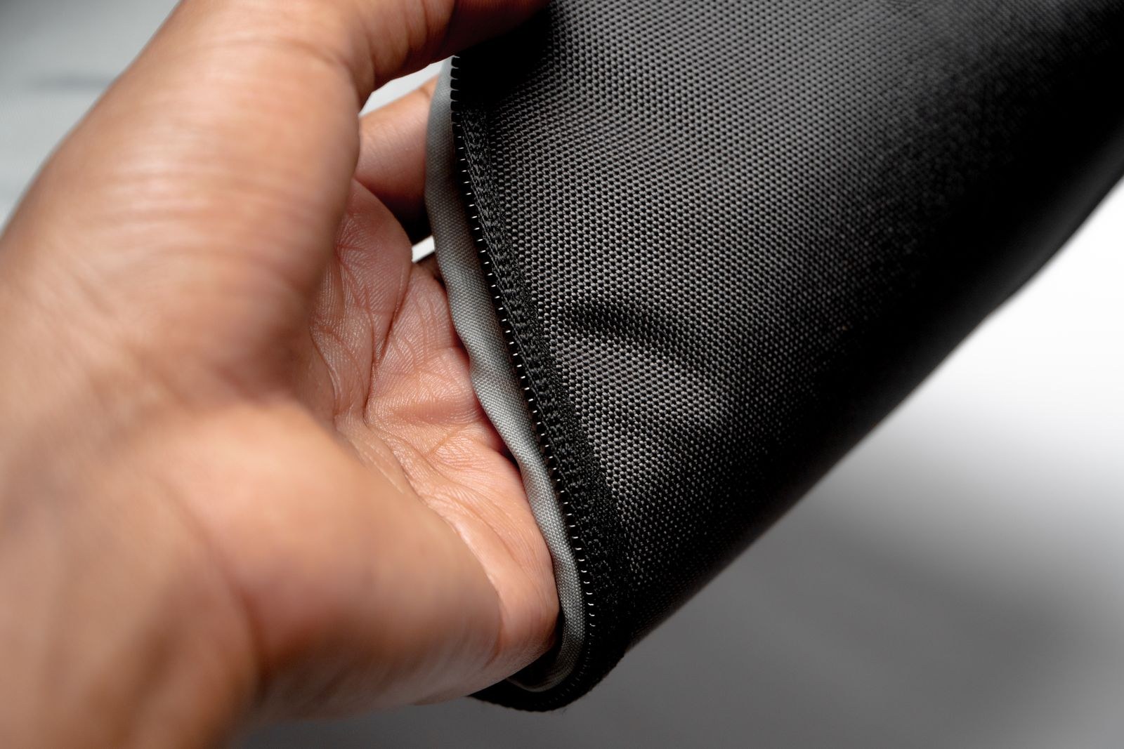 Polyester Wets Through in Rain While Nylon Jacket Beads Soak