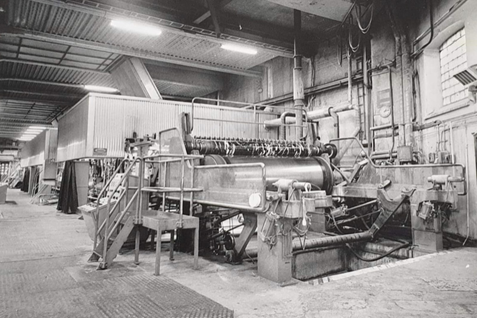 Paper Machine White Water Foams Up the Wire Section Once Tem